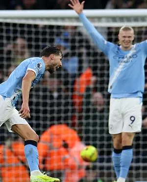 Man City en Jérémy Doku boeken vlotte zege tegen Sunderland en zetten Arsenal onder druk